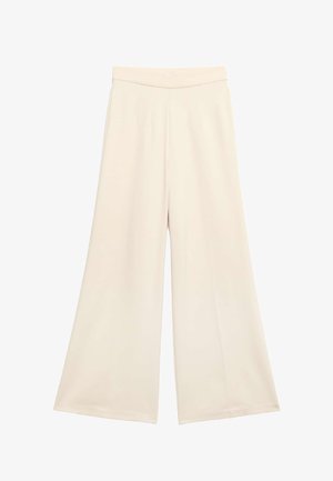 Pantalon large crème avec une texture lisse et une taille élastique, présentant un design fluide et une construction sans coutures.