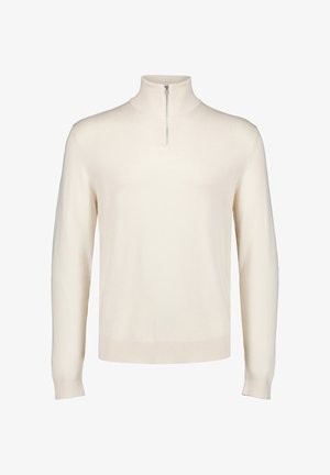 Roomkleurige trui met lange mouwen, een hoge kraag en een korte zilveren rits in het midden aan de voorkant.