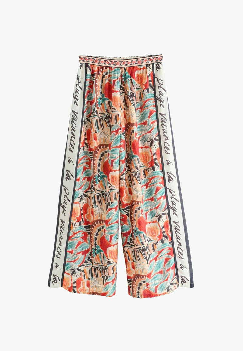 Pantalones palazzo confeccionados con tela ligera y estampados florales vibrantes en rojo, verde y negro. Cuentan con una cintura elástica con ribete decorativo.