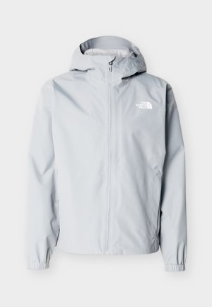 Šviesiai pilka gobtuvu apsauganti nuo lietaus striukė su priekiu užtrauktuku, elastiniais rankogaliais ir „The North Face“ logotipu ant krūtinės.