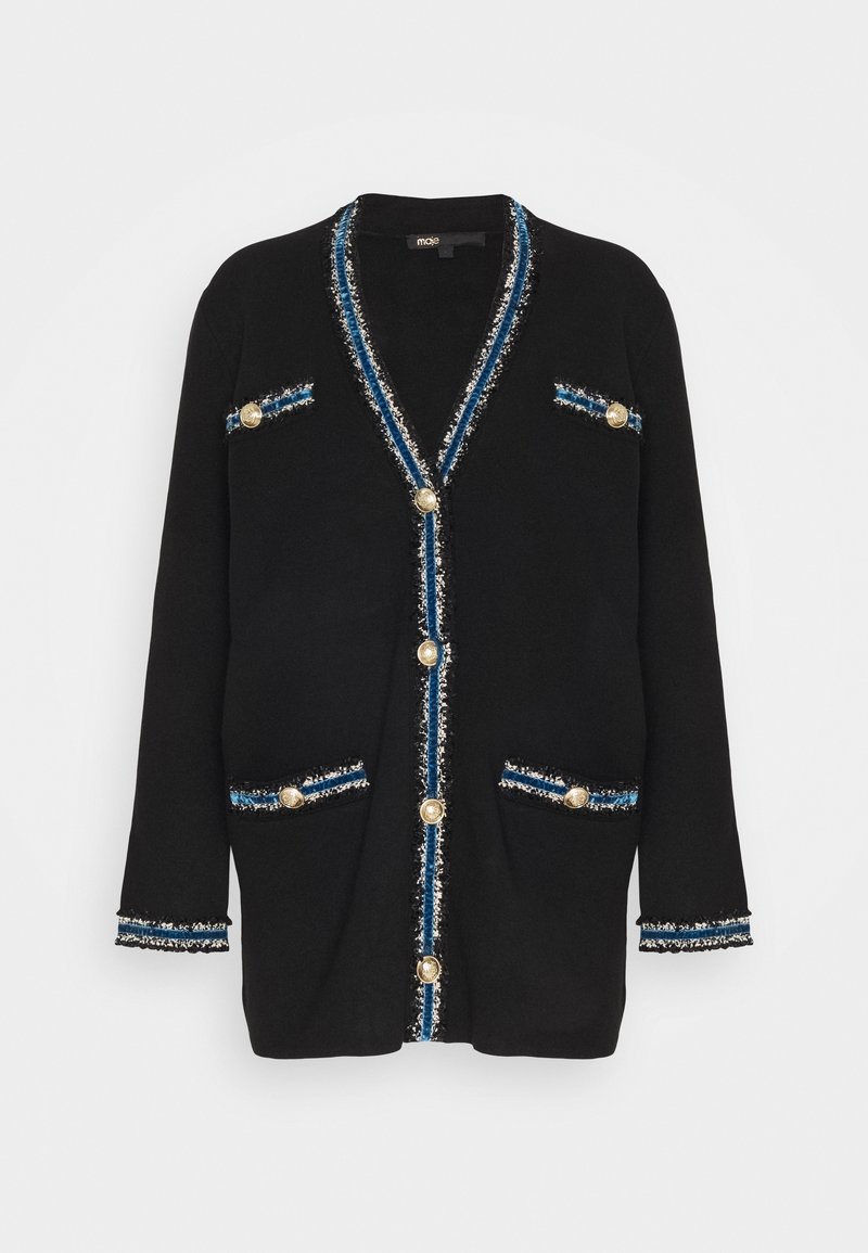 Lange zwarte cardigan met blauw en witte accenten, voorzien van gouden knopen aan de voorkant, op de zakken en als borstdetail.