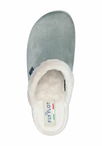 Gray suede slipper with a white faux fur lining and a textured sole. Features a fabric label with “FLYFLOT” branding in blue and red.