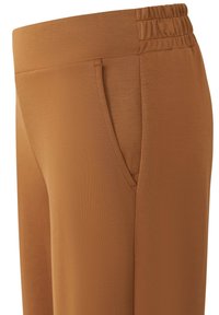 Braune, dehnbare Hose mit hohem Bund. Verfügt über eine seitliche Tasche und hat eine glatte Textur, die für Komfort und Bewegungsfreiheit sorgt.