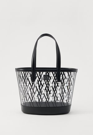 Černá a průhledná taška na rameno se geometrickým vzorem, se dvěma černými rukojeťmi a pevným černým dnem, s čtvercovým logem na přední straně.