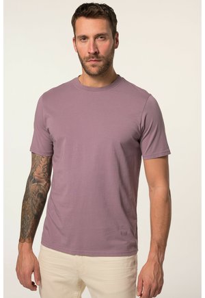 Kortærmet t-shirt med rund hals i afdæmpet lavendel, lavet af blødt bomuld med en glat struktur. Har et tætsiddende design og ingen synlige logoer.