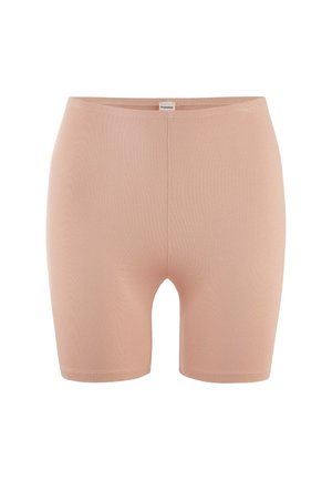 Naadloze, huidkleurige damesbikershorts met een hoge taille en een lengte tot halverwege de dij, voorzien van een klein stoffen merklipje aan de tailleband.