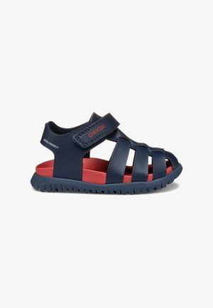 Blaue, wasserfreundliche Sandalen mit geschlossenem Zehendesign, gekreuzten Riemen und roter Innensohle, geeignet für den Freizeitgebrauch. Gummisohle.