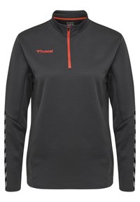 Zwarte quarter-zip pullover met rode rits en logo, met lange mouwen en gestileerde accenten aan de zijkanten. Geweven stofafwerking.