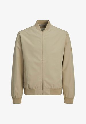 Giacca bomber beige con chiusura a zip, colletto, polsini e fondo a coste. Tessuto liscio e leggero senza motivi o accenti visibili.