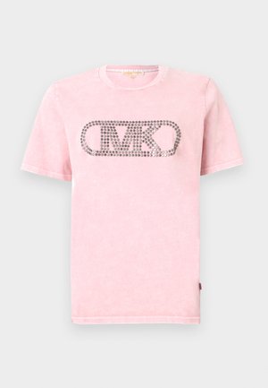 Pink cotton t-shirt with short sleeves, featuring a silver rhinestone "MK" logo in an oval shape on the front. Soft and slightly textured.
