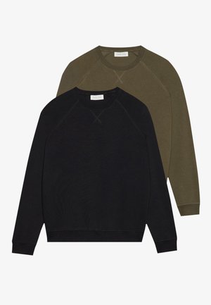 Two crewneck sweatshirts, one black and one olive green, with raglan sleeves and visible stitching. Soft fabric texture, no patterns.