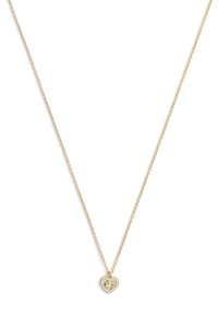 Gold necklace with a delicate chain, featuring a heart-shaped pendant adorned with small clear stones and a central design detail.