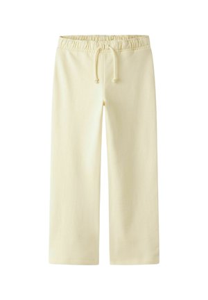 Pantalon large couleur crème avec taille élastique et cordon de serrage, fabriqué en tissu lisse, présenté à plat sur fond blanc.