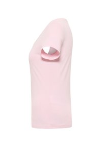T-shirt rose clair à manches courtes et col rond, présenté de profil sur fond blanc.