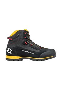 Scarpa da trekking nera e gialla con materiale in suede e rete, punta rotonda, occhielli rinforzati e design con lacci. Presenta un logo sul lato.