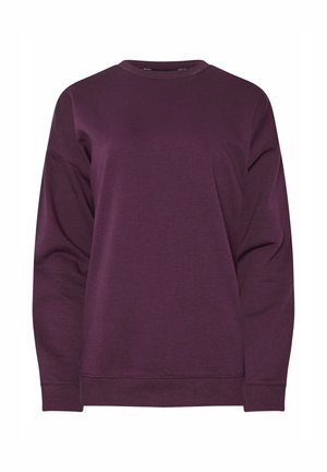 Violetti collegepaita pehmeästä kankaasta, jossa on pyöreä kaula-aukko, pitkät hihat ja ribbireunat. Mallissa on löysä istuvuus ja yksinkertainen muotoilu.