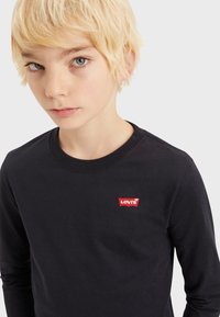 Levi's® BATWING CHEST HIT TEE - Maglietta a manica lunga - black