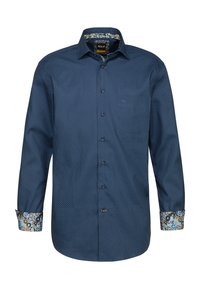 Camicia blu navy con piccoli pois bianchi, presenta un polsino e un colletto foderati con un motivo floreale. Realizzata in un tessuto testurizzato.