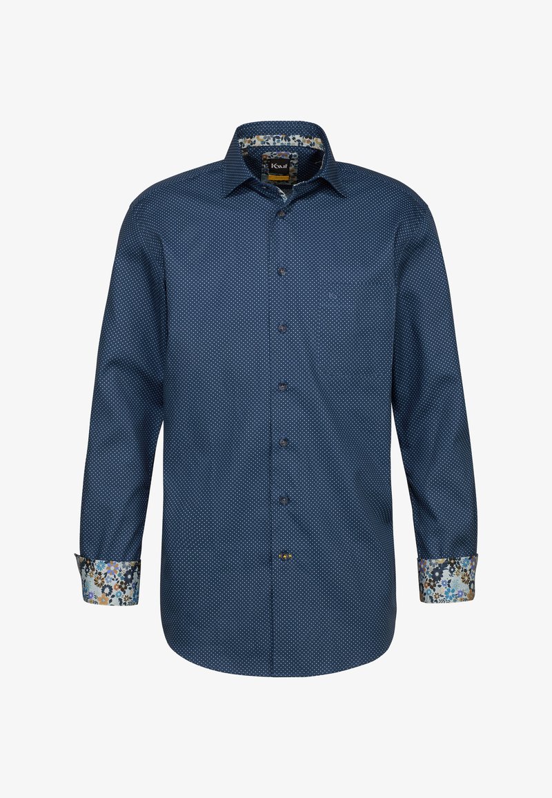 Camicia blu navy con piccoli pois bianchi, presenta un polsino e un colletto foderati con un motivo floreale. Realizzata in un tessuto testurizzato.