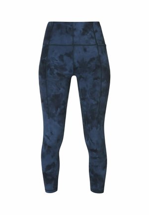 Marineblauwe legging met een tie-dye patroon, voorzien van een hoge tailleband en een aansluitend model. Soepele stof met platte naden.
