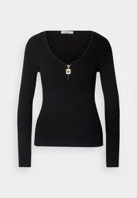 Top lungo a maniche con costine nere, caratterizzato da un profondo scollo a V e una chiusura con zip dorata sul davanti, realizzato in un materiale elasticizzato per un look aderente.