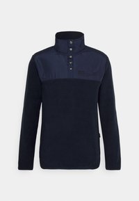 Marineblauer Fleecepullover mit hohem Kragen, der ein kontrastierendes Oberteil, Druckknöpfe und ein aufgedrucktes Logodetail auf der Brust aufweist.