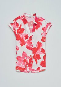 Camicia a maniche corte con bottoni, bianca con grande stampa floreale rossa. Presenta un colletto e un orlo curvo. Tessuto leggero con una texture liscia.