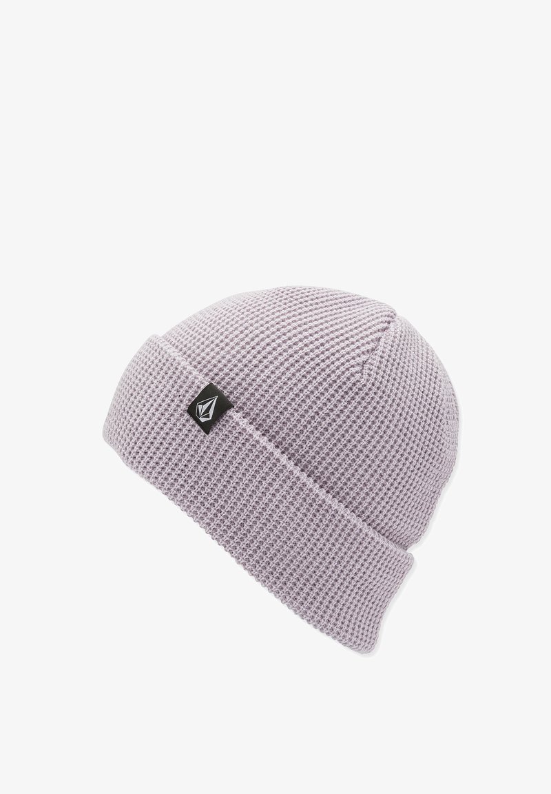 Light purple knitted beanie with a turned-up cuff, featuring a small black logo tag on the side. Texture is woven and airy.