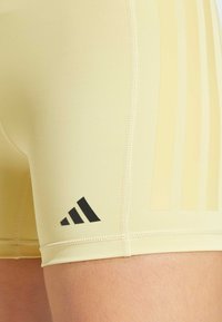 adidas Performance OPTIME 3 STRIPES - Leggings - powder yellow