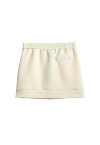 Falda de punto beige con cintura elástica, dobladillo texturizado y una etiqueta con botones en la parte posterior. Tejido suave, diseño casual.
