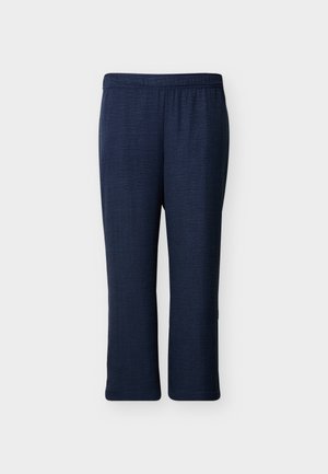 Σκούρο μπλε παντελόνι χαλαρής εφαρμογής με ελαστική μέση, ίσια μπατζάκια και υφή υφάσματος σε ανοιχτό φόντο.