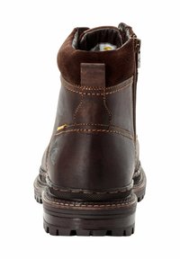 Brown leather ankle boot with a round toe, textured suede collar, side zipper, reinforced stitching, and a rugged treaded sole.