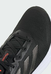adidas Performance RESPONSE - Katujuoksukengät - core black
