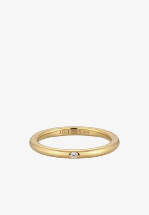Dünner goldener Ring mit kleinem, mittig sitzendem Diamanten, innen mit "JGJ 925 Ag" gestempelt.