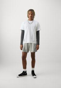 GAP Pantaloni de trening - light heather grey