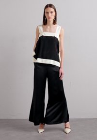 By Malene Birger LUCEE - Kelnės - black