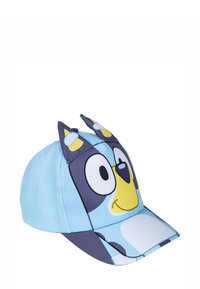 Niebieska czapka z motywem postaci z kreskówki, w tym uszami na górze, z dominującym jasnoniebieskim kolorem i ciemnoniebieskimi akcentami.