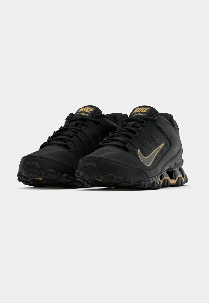 Nike Black and Gold Athletic Shoes with Textured Upper Nike Performance FLEX RUNNER 4 UNISEX - Road running shoes  main image 3