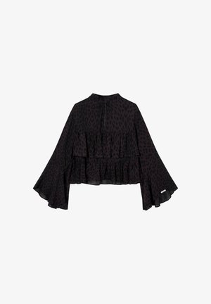 Musta, läpikuultava pusero leopardikuosisena, jossa on röyhelökerroksia ja kellohihat. Korkea kaulus takana avattuna avaimenreiällä.