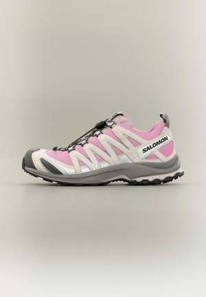 Light pink and white Salomon hiking shoe with gray sole and black quick-lace system, shown in profile on neutral background.