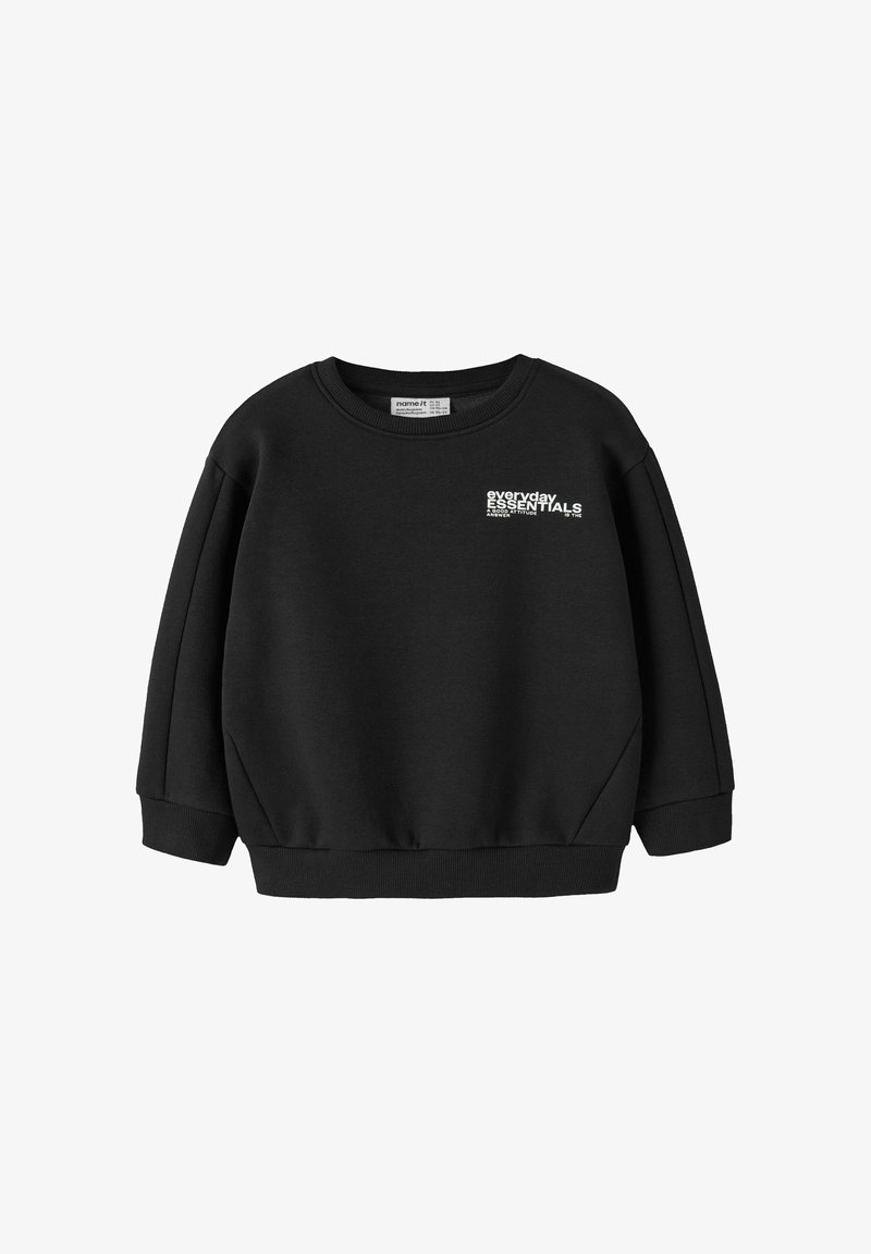 Felpa nera con collo rotondo a costine, spalle scese e polsini. Presenta il testo bianco "everyday ESSENTIALS" sul davanti. Materiale morbido.
