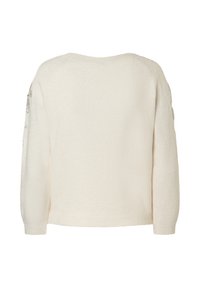 Cremefarbener Pullover, weiche Textur, lockere Passform, runder Ausschnitt, raglanärmel, mit gestickten Details an den Ärmeln.