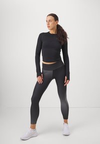 Nike Performance RUN - Langarmshirt - black