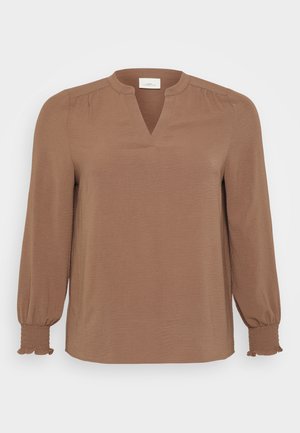 Brown, long-sleeve blouse in lightweight fabric with a V-neck. Features smocked cuffs and subtle texture, offering a relaxed fit.
