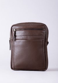 Brown leather bag with zippered front pocket, rectangular shape, smooth texture, rounded corners, and visible stitching detail.