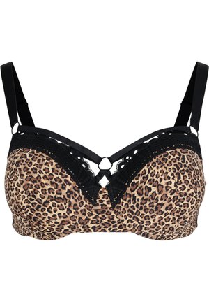 Reggiseno invisibile e senza spalline, i modelli da scollatura profonda