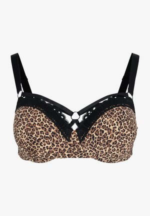 Reggiseno invisibile e senza spalline, i modelli da scollatura profonda Reggiseno invisibile e senza spalline, i modelli da scollatura profonda