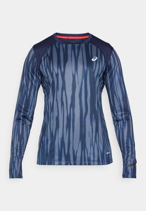 Long-sleeve athletic shirt made of stretch fabric, featuring a navy gradient pattern with vertical stripes and a ribbed collar.