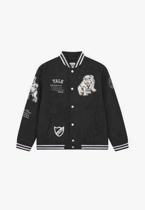 Black varsity jacket with white stripe accents, featuring embroidered Yale bulldog graphics and text on front and sleeves, and side pockets.