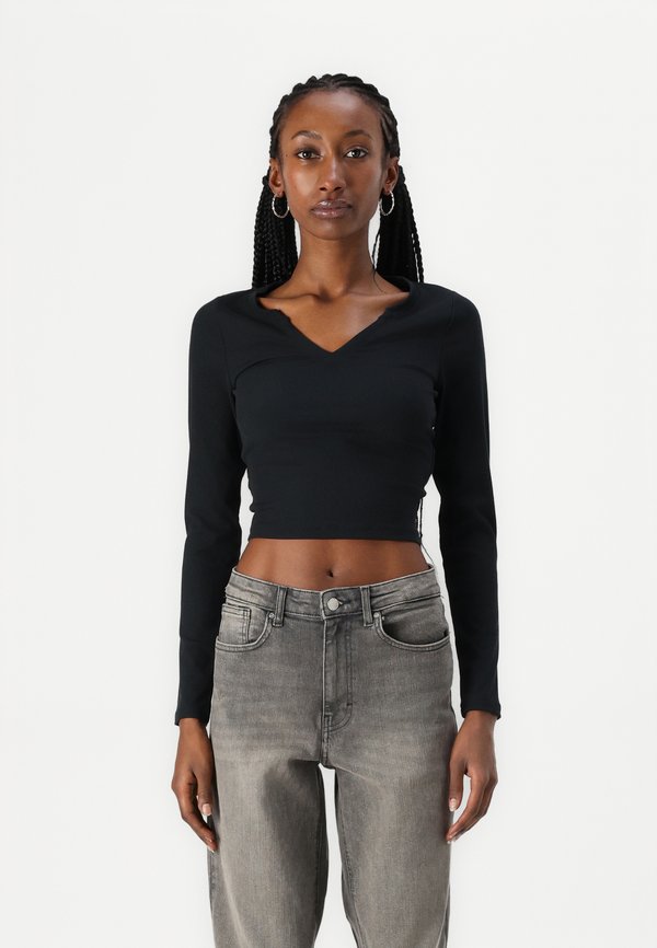 Ribbbed Seamless Fabric Notch-Neck Top - Long sleeved top